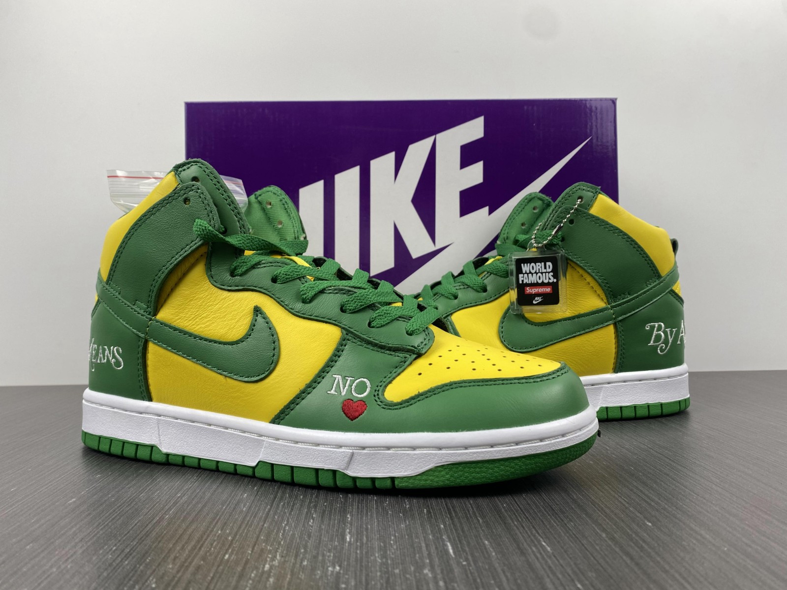 Supreme x Nike SB Dunk High “By Any Means” DN3741-700