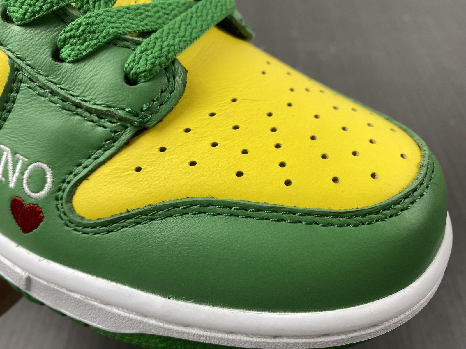 Supreme x Nike SB Dunk High “By Any Means” DN3741-700